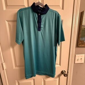 Men’s Stitch Golf teal and navy polo
